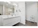 Modern bathroom with double vanity, sleek fixtures, and ample counter space at 2140 W Mitchell Dr, Phoenix, AZ 85015