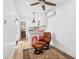 Comfortable living room with a cozy kitchen, a stylish armchair, and a decorative rug at 2140 W Mitchell Dr, Phoenix, AZ 85015
