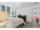Spacious bedroom with neutral tones, ample natural light, and elegant furnishings at 2140 W Mitchell Dr, Phoenix, AZ 85015