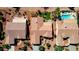 Aerial view showcasing backyard pools and an outdoor seating area in a desert community at 23108 N Pedregosa Dr, Sun City West, AZ 85375