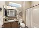 Updated bathroom with granite counters, updated fixtures, tile accents, and natural light at 23108 N Pedregosa Dr, Sun City West, AZ 85375