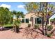 Charming home exterior featuring desert landscaping and a well-maintained lawn at 23108 N Pedregosa Dr, Sun City West, AZ 85375