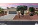 Charming single-story home featuring a two-car garage and mature landscaping at 23108 N Pedregosa Dr, Sun City West, AZ 85375