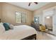 Serene bedroom with balcony access, dresser, and neutral color scheme at 3330 S Gilbert Rd # 2090, Chandler, AZ 85286