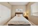 Relaxing bedroom featuring a soft bed, natural light from the window, and closet at 3330 S Gilbert Rd # 2090, Chandler, AZ 85286