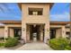 Well-manicured entrance to community clubhouse with manicured shrubs and desert landscaping at 3330 S Gilbert Rd # 2090, Chandler, AZ 85286