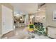 Open floor plan with tile entryway flowing into a living space with an adjacent kitchen at 3330 S Gilbert Rd # 2090, Chandler, AZ 85286