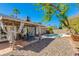 Relaxing backyard with patio, mature trees, and a sparkling blue pool at 3544 E Tonto Ln, Phoenix, AZ 85050
