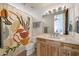 Bathroom features a vibrant shower curtain, tile flooring, and a spacious vanity at 36190 N Creek View Ln, Cave Creek, AZ 85331