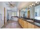 Spacious bathroom with double sinks, jetted tub, and custom cabinets at 36190 N Creek View Ln, Cave Creek, AZ 85331