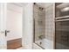 Bathroom featuring tile flooring, shower-tub combination, and updated fixtures at 374 E Verde Ln, Phoenix, AZ 85012