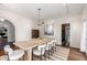 Dining room with view into the kitchen and entry way at 374 E Verde Ln, Phoenix, AZ 85012