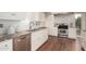 Updated kitchen with stainless steel dishwasher, granite countertops and classic white cabinets at 374 E Verde Ln, Phoenix, AZ 85012