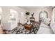 Bright and airy living room featuring hardwood floors, neutral furniture, and plenty of natural light at 374 E Verde Ln, Phoenix, AZ 85012