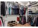Walk-in closet featuring shelving and clothing racks for optimal organization at 3875 E Juanita Ave, Gilbert, AZ 85234