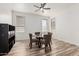 Bright dining room features modern decor, a ceiling fan, and natural light at 3875 E Juanita Ave, Gilbert, AZ 85234