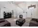 Spacious living room boasts high ceilings, a staircase, and ample natural light at 3875 E Juanita Ave, Gilbert, AZ 85234