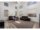 Spacious living room boasts high ceilings, bright neutral paint, and ample natural light at 3875 E Juanita Ave, Gilbert, AZ 85234