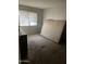 Bedroom featuring a window with blinds, carpeted floor and interior space at 3944 W Camelback Rd, Phoenix, AZ 85019