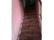Carpeted staircase showing wear and tear at 3944 W Camelback Rd, Phoenix, AZ 85019