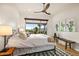 Bright bedroom with large windows offering scenic desert views at 39912 N 98Th Way, Scottsdale, AZ 85262