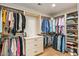 Organized walk-in closet with custom shelving and ample storage space at 39912 N 98Th Way, Scottsdale, AZ 85262
