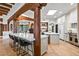 Elegant kitchen featuring a spacious island, counter seating, and stylish finishes at 39912 N 98Th Way, Scottsdale, AZ 85262