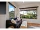 Living room features desert views, a comfortable sofa, and stylish decor at 39912 N 98Th Way, Scottsdale, AZ 85262