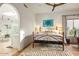 Main bedroom with hardwood floors, ensuite bath, and natural light at 39912 N 98Th Way, Scottsdale, AZ 85262