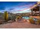 Beautiful pool area with desert plants and landscape, perfect for outdoor living and relaxation at 39912 N 98Th Way, Scottsdale, AZ 85262