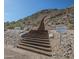 Scenic hiking trail with wooden stairs leading up a desert mountain, inviting outdoor adventures at 4013 N Founder Cir, Buckeye, AZ 85396