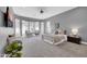 Spacious primary bedroom with sitting area and neutral color palette at 4013 N Founder Cir, Buckeye, AZ 85396