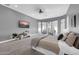 Bright main bedroom with decorative pillows and accent furniture at 4013 N Founder Cir, Buckeye, AZ 85396