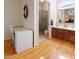 Bathroom featuring a vanity with sink and a shower with glass door at 4014 W Anderson Dr, Glendale, AZ 85308