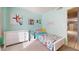 Bright bedroom with soft carpet, a full bed, and natural light at 4014 W Anderson Dr, Glendale, AZ 85308