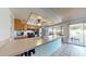 Open kitchen features stainless steel appliances, an island countertop, and views to the patio at 4014 W Anderson Dr, Glendale, AZ 85308