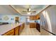 Open kitchen showcasing a spacious countertop, stainless steel appliances, and a ceiling fan at 4014 W Anderson Dr, Glendale, AZ 85308