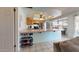 Bright kitchen with stainless steel appliances and breakfast bar seating at 4014 W Anderson Dr, Glendale, AZ 85308