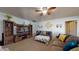 Inviting living room featuring rustic entertainment center and comfortable seating arrangement at 4014 W Anderson Dr, Glendale, AZ 85308