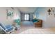 Comfortable living room with soft blue walls and carpeted floor at 4014 W Anderson Dr, Glendale, AZ 85308