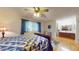 Relaxing main bedroom featuring ample natural light and ensuite bathroom at 4014 W Anderson Dr, Glendale, AZ 85308