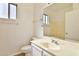Bright bathroom featuring an extended vanity with large mirror and neutral decor at 516 N Emery --, Mesa, AZ 85207