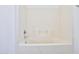 Clean bathtub with white tile surround and silver fixtures at 516 N Emery --, Mesa, AZ 85207