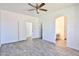 Spacious primary bedroom with wood-look flooring and connected bathroom at 516 N Emery --, Mesa, AZ 85207