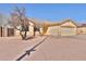 Beige single-story home with a desert landscape at 516 N Emery --, Mesa, AZ 85207