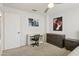 Bright bedroom with carpet flooring and closet, offering a clean and simple design with functional storage options at 5309 W Angela Dr, Glendale, AZ 85308