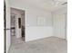 Neutral-toned bedroom offering a tranquil and customizable space with closet and easy access to other rooms at 5309 W Angela Dr, Glendale, AZ 85308