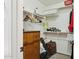 Organized closet featuring built-in shelving, hanging rods, and space for storage bins and a dresser at 5309 W Angela Dr, Glendale, AZ 85308