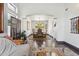 Open dining room featuring hardwood floors and view to a living area at 5309 W Angela Dr, Glendale, AZ 85308