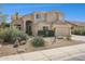 Stunning two-story home featuring a tile roof, low-maintenance landscaping and an attached two car garage at 5309 W Angela Dr, Glendale, AZ 85308